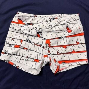 Born Primitive White and Orange Graphic Shorts